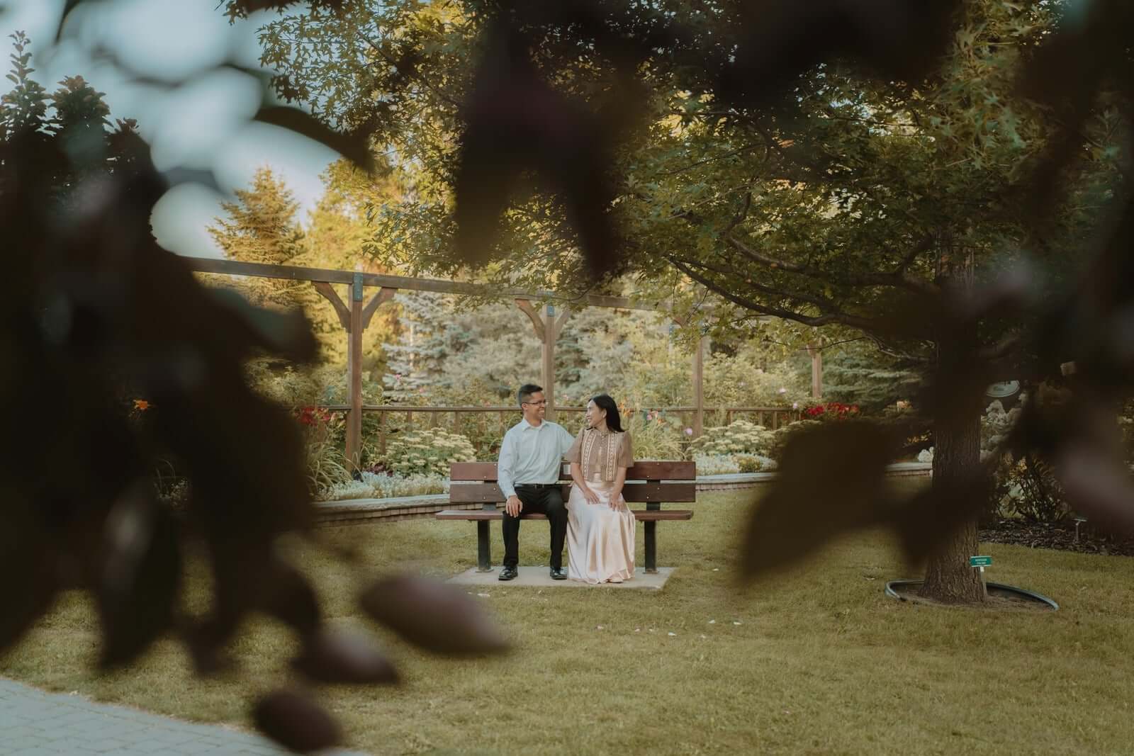 Kevin and Ruth sitting together on a garden bench